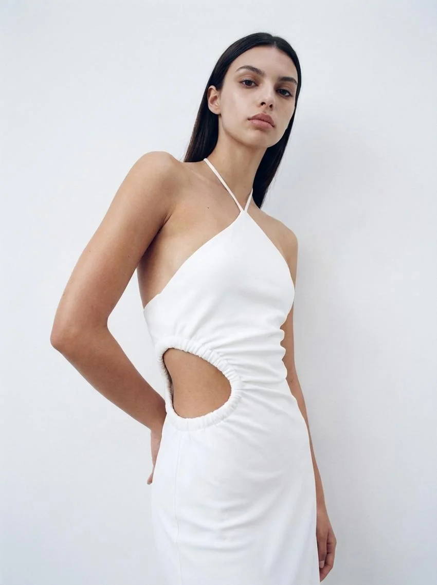 AI-generated image of digital model Jara in a white halter dress on a white background